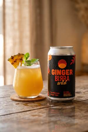 Lata Ginger Birra 220 ml junto a un Moscow Mule preparado